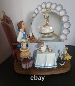 Disney Beauty & The Beast plates snow-globe rare and it is beautiful