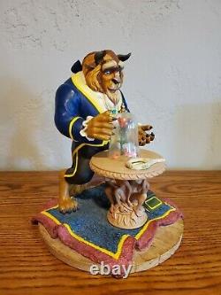 Disney Beauty and the Beast figurine of Beast with Rose. MINT Condition