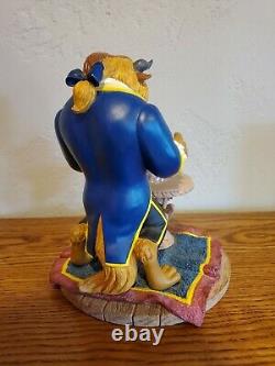 Disney Beauty and the Beast figurine of Beast with Rose. MINT Condition