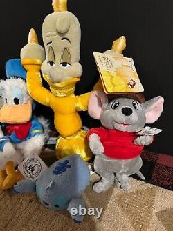 Disney Store/ World 9 Plush Lot Donald, Beast, Lumiere, Stitch, Read for more