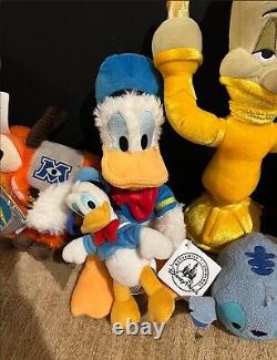 Disney Store/ World 9 Plush Lot Donald, Beast, Lumiere, Stitch, Read for more