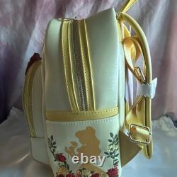 Loungefly Disney Beauty and the Beast Rose Mini Backpack Cream Yellow Pink