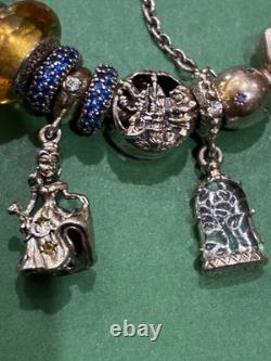Pandora bracelet and other sterling silver Disney beauty and the beast charms