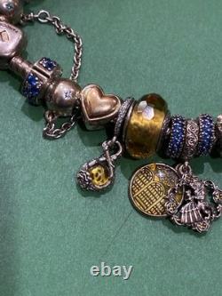 Pandora bracelet and other sterling silver Disney beauty and the beast charms